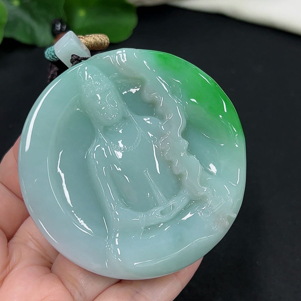 Jadeite Guanyin pendant with intricate carving, weighing approximately 101g including rope, from HKHQ.