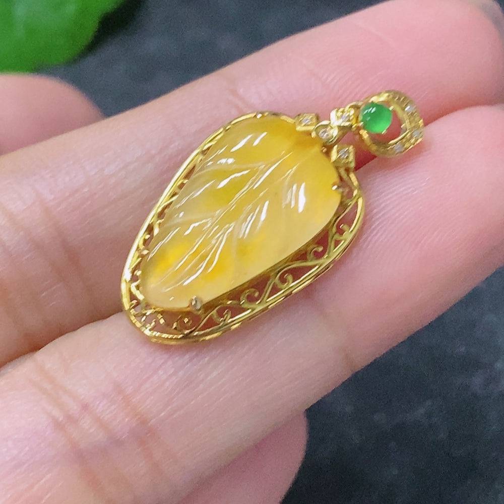 Huiliu Jadeite leaf pendant with diamond accents, featuring yellow and green hues, crafted with detailed inlay work.