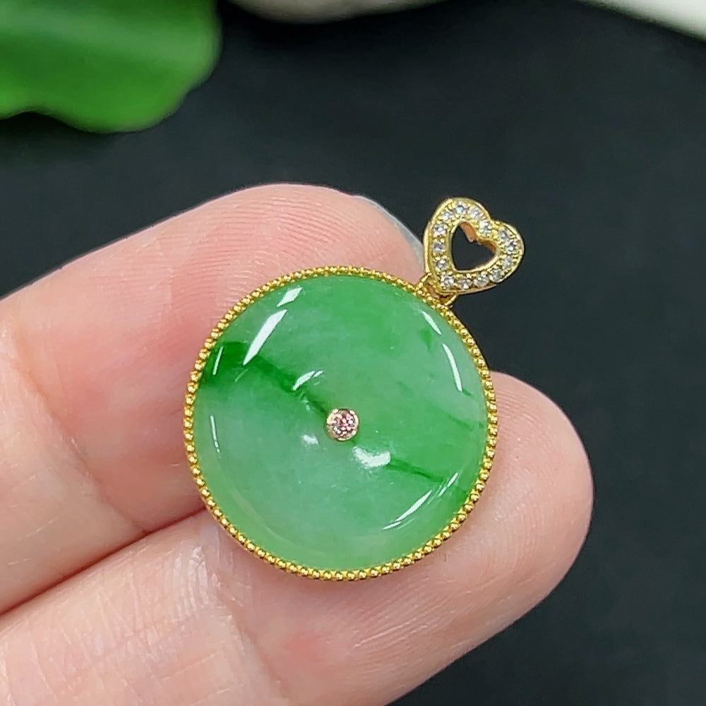 Jadeite safety buckle pendant in 9K gold from HKHQ, featuring a smooth green jade piece with gold setting, weighing about 2.2g.
