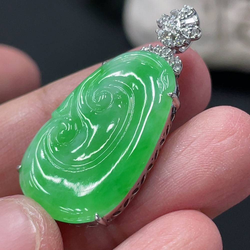Jadeite Ruyi pendant with 18K gold and diamond accents, featuring intricate inlaid jade design, from HUILIU HQ.