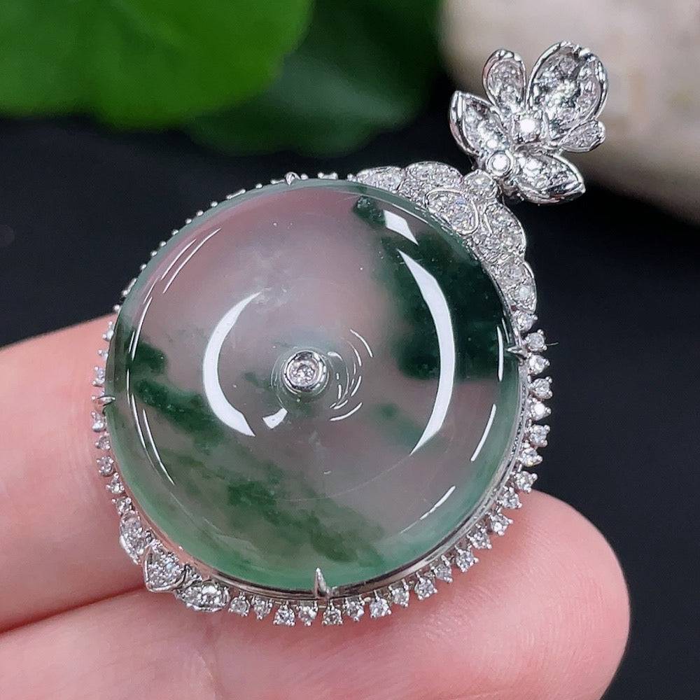 Jadeite Peace Knot pendant with 18K gold accents and diamond details, crafted with smooth jade and intricate design.