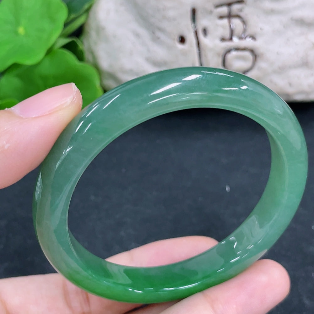 HKHQ jadeite round bangle, size 54, weighing 38.5g, showcasing smooth, polished jadeite bracelet with a rounded shape.