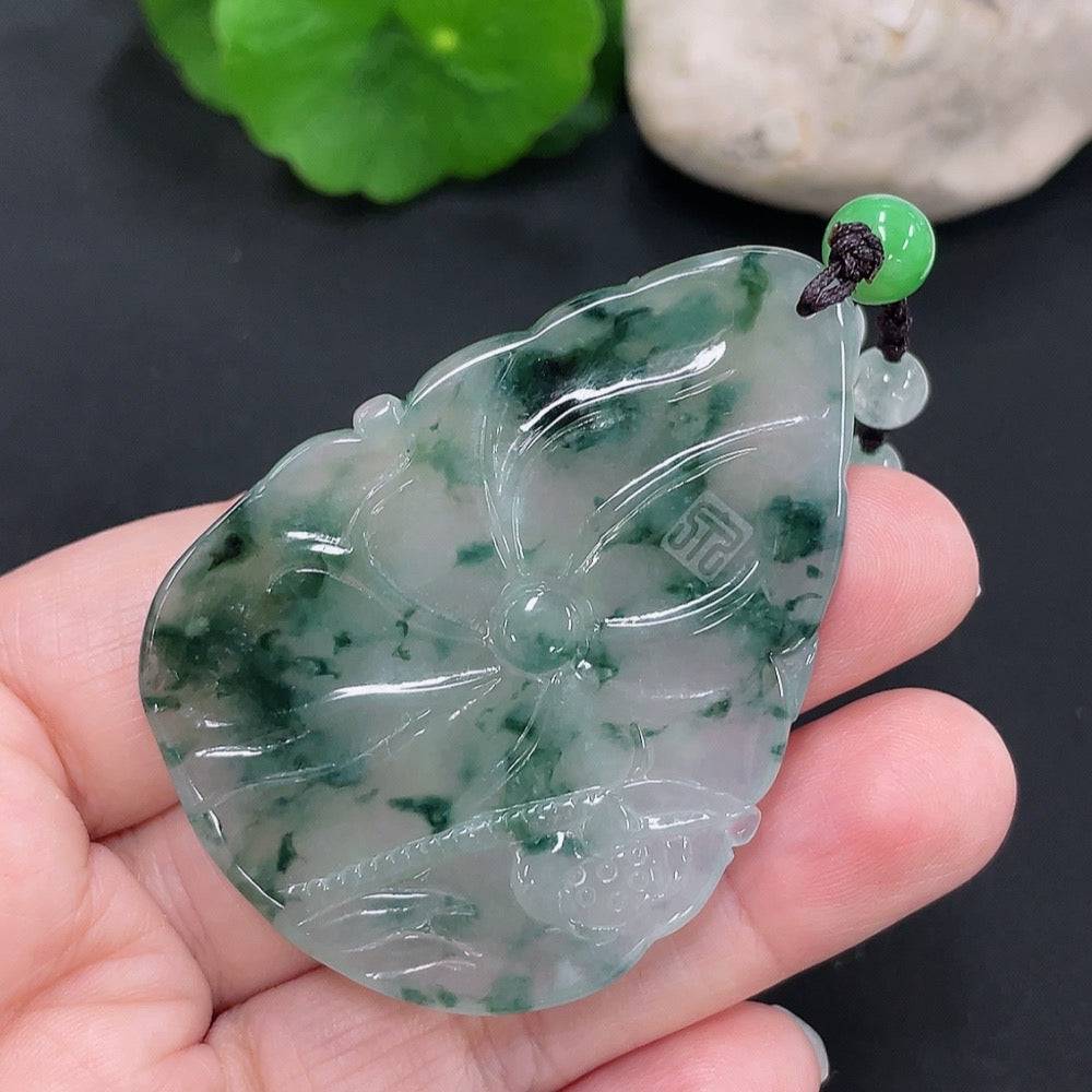 Huiliu Jadeite Auspicious Yearly Abundance Pendant featuring intricate carvings and a polished jade surface.