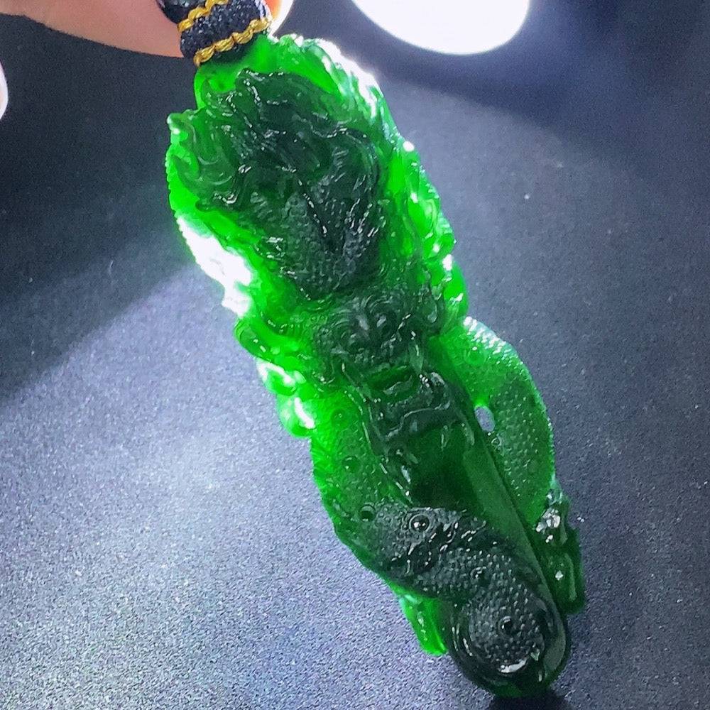 Huiliu Jadeite pendant featuring a detailed dragon plaque with rope, crafted from green jade for elegant jewelry display.