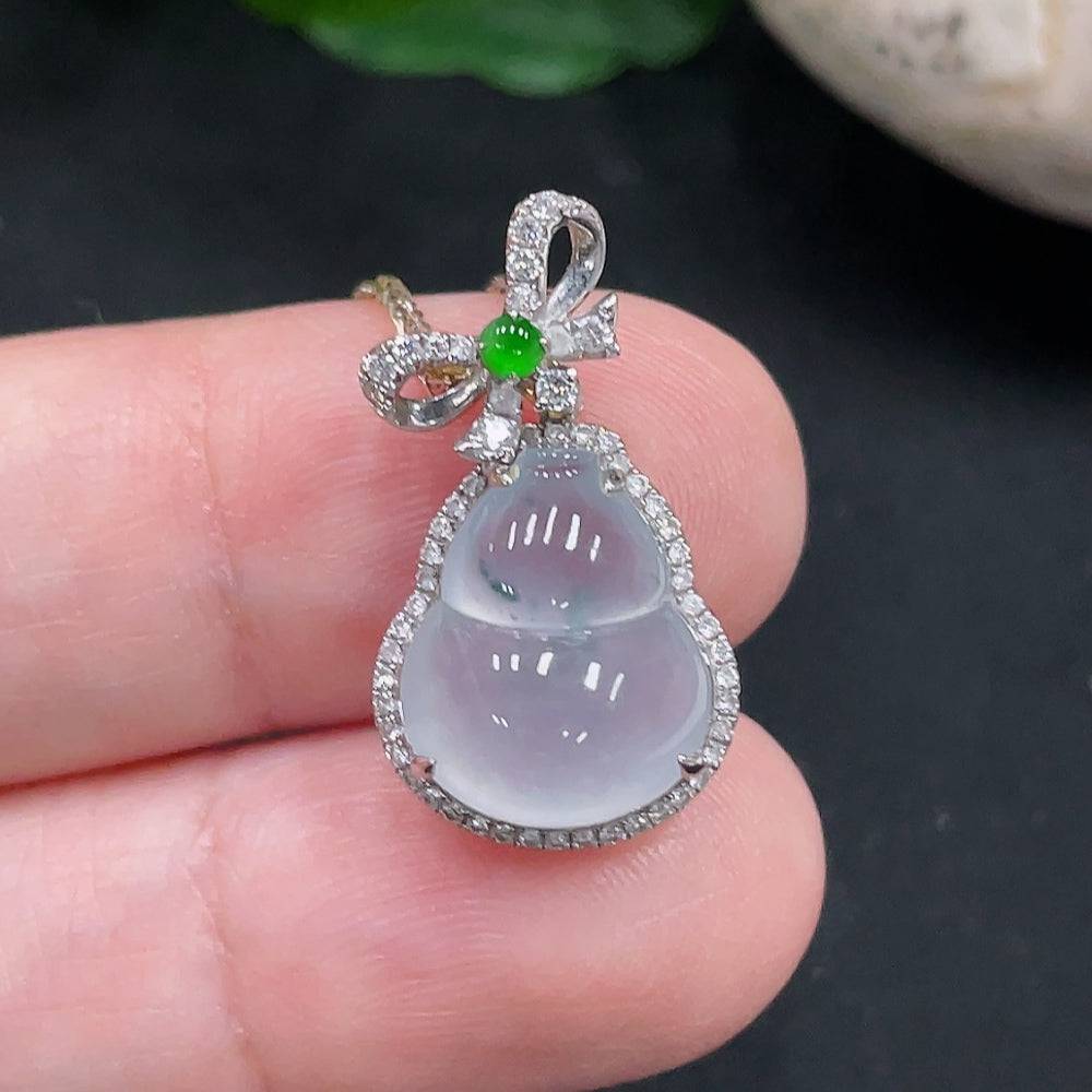 Jadeite gourd pendant with 18K gold accents and diamond details, weight 4.7g, featuring a polished green jade surface.