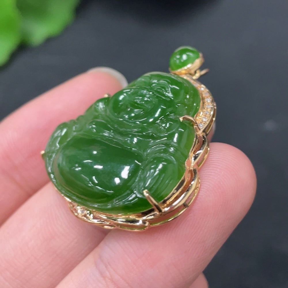 Hetian jade Buddha pendant in 18K gold with diamond accents, featuring a detailed jade carving and a gold chain.