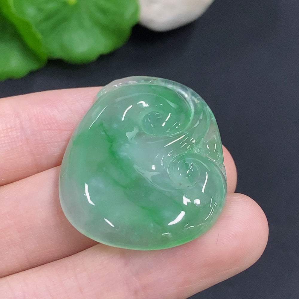 Jadeite Ruyi pendant with intricate carvings, weighing approximately 10.5g, crafted from high-quality jade by HKHQ.