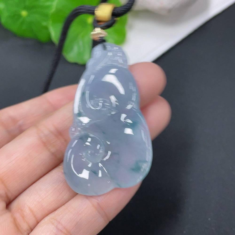 Jadeite pendant with Ruyi design, weighing 15.72g including rope, crafted by HUILIU HQ, featuring a smooth, polished jade surface.