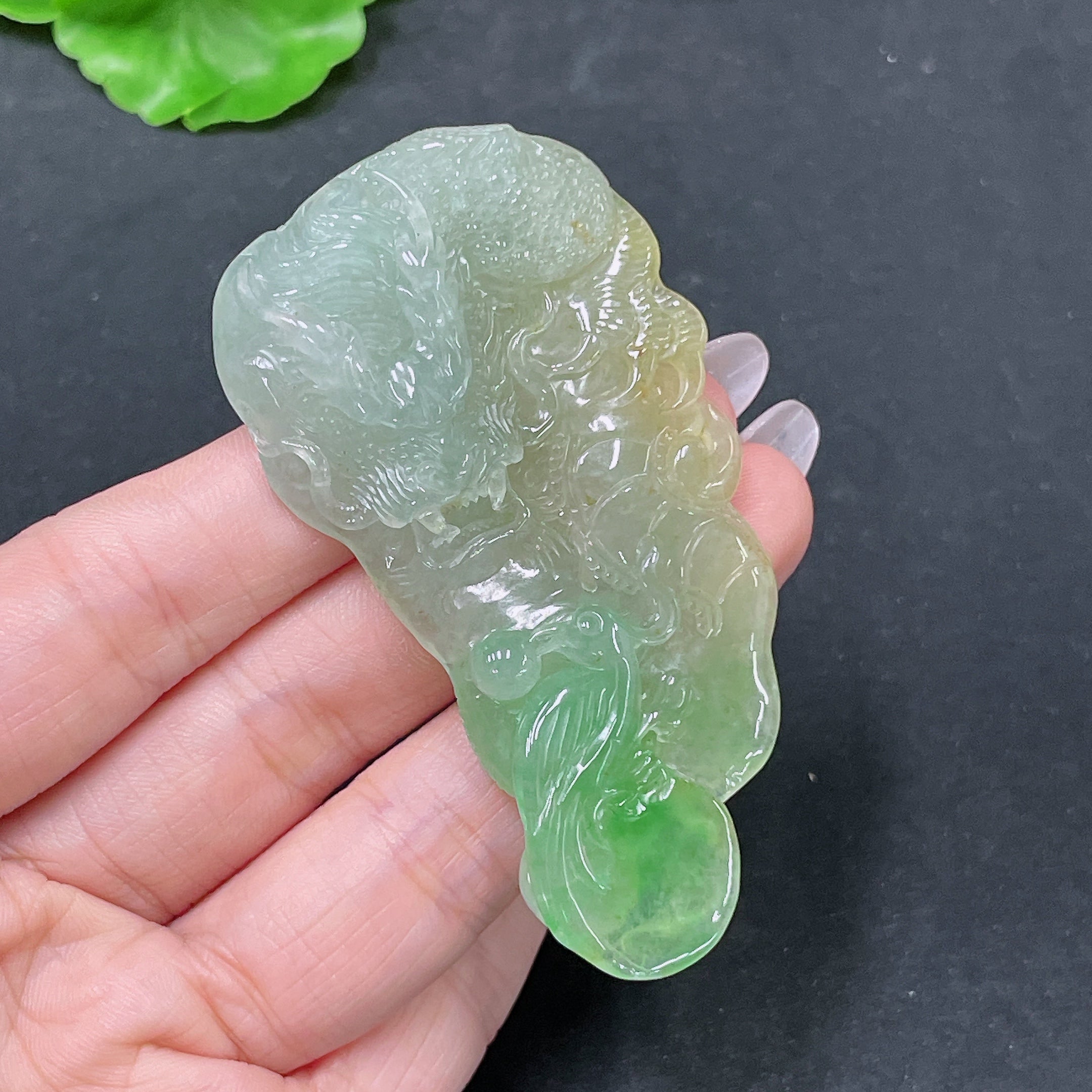 HUILIU HQ jadeite pendant featuring a detailed dragon plaque, weighing approximately 36.62 grams, with intricate carved design.