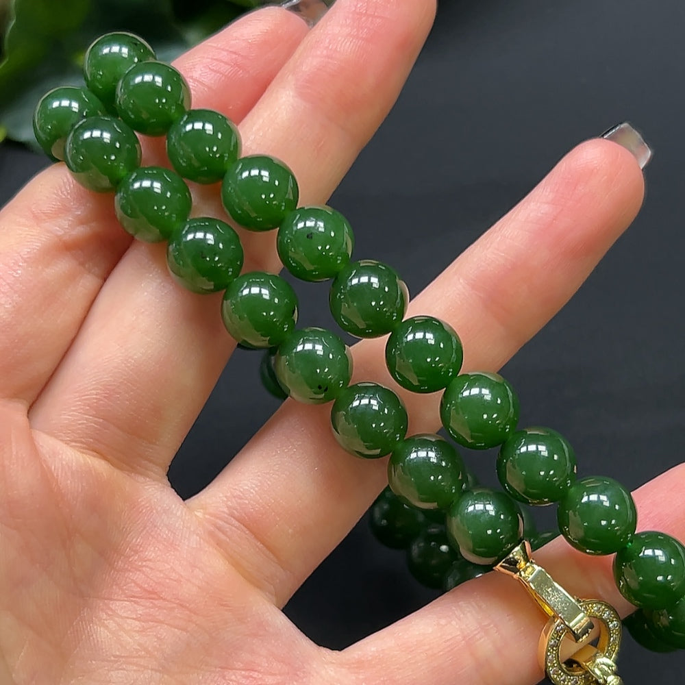 Hetian jade bead necklace by HKHQ featuring 9.6mm non-gold beads, approximately 68.36g, displayed on a neutral background.