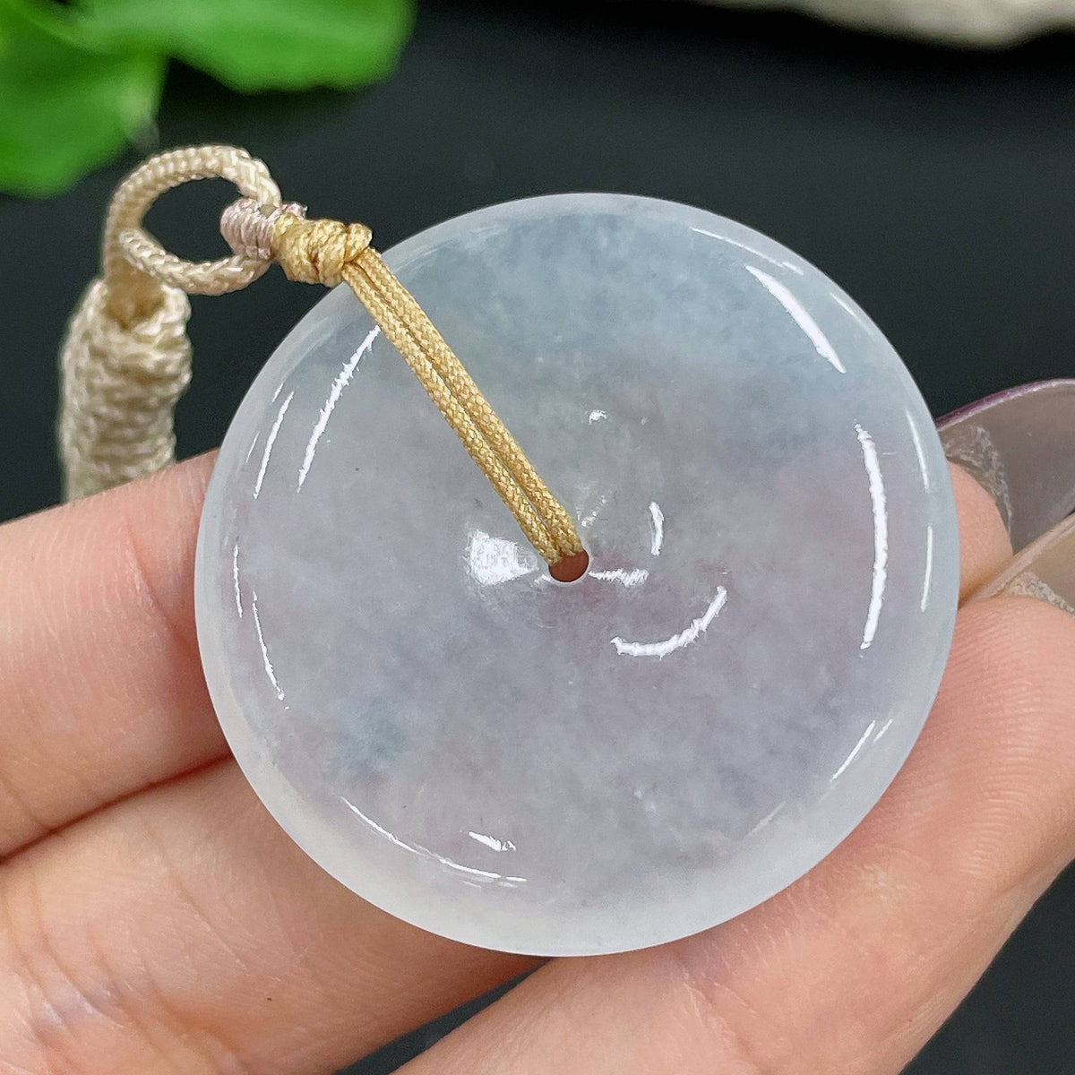 HUILIU HQ jadeite Peace Knot pendant with cord, approx. 15.25g, showcasing smooth green jade with intricate knot design.