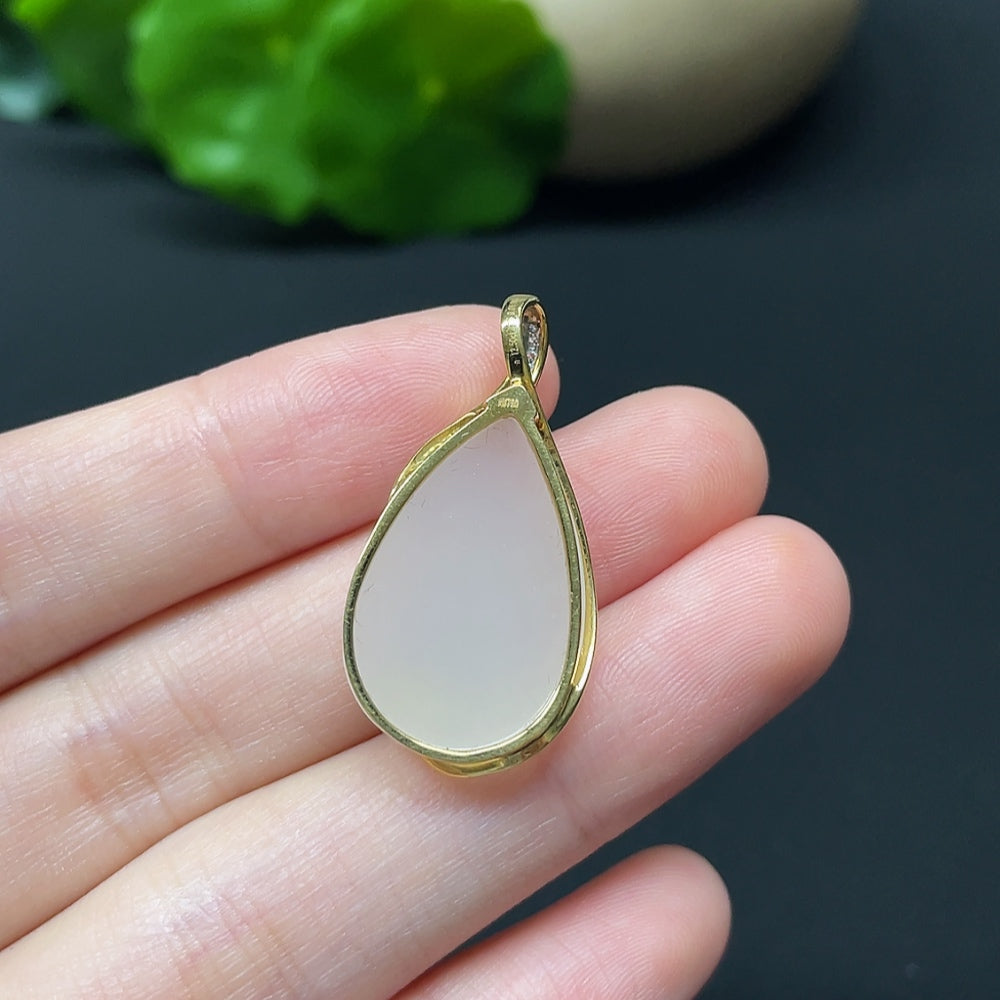 Hetian jade water drop pendant necklace with 18K gold and diamond accents, elegant jewelry piece by HKHQ.