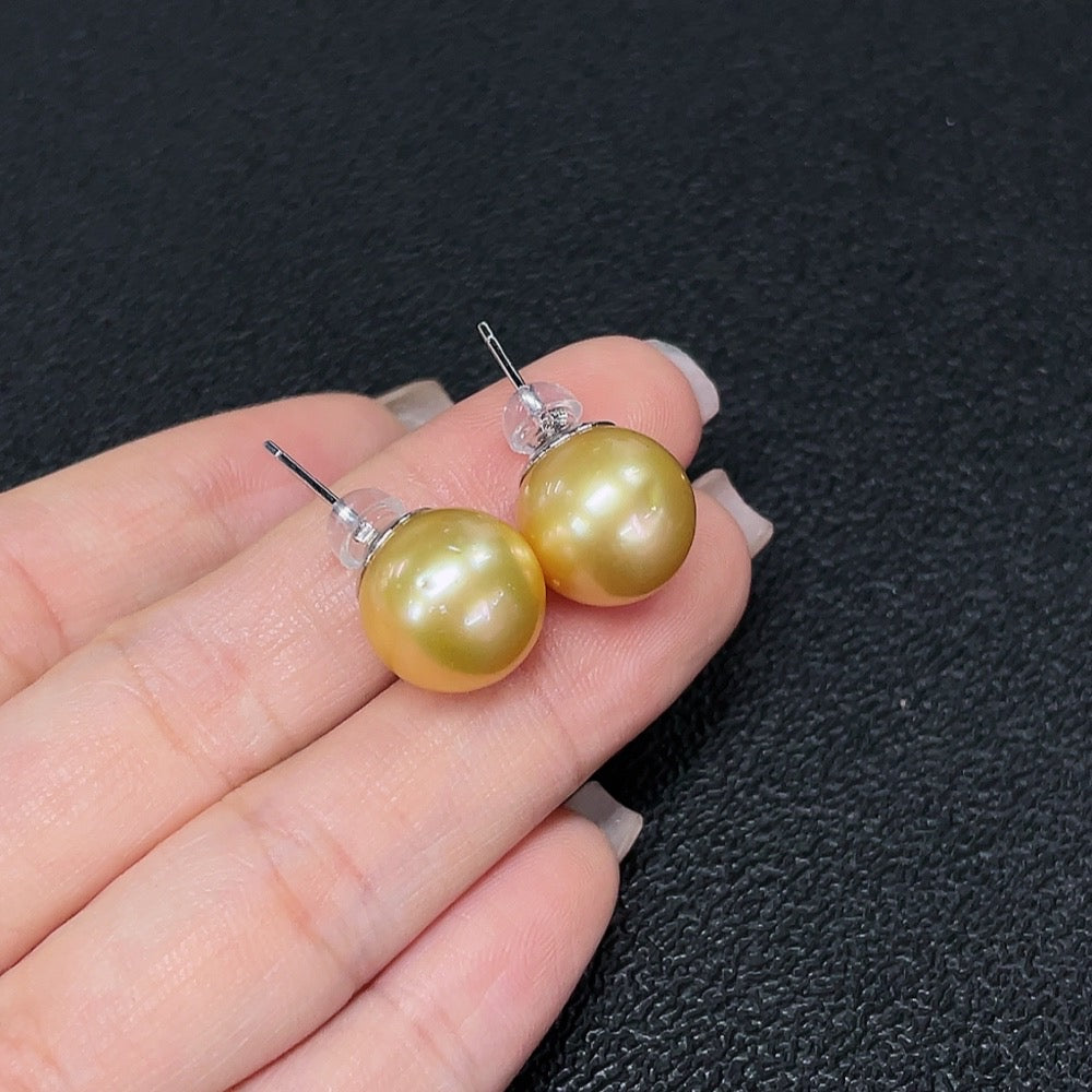 HKHQ seawater pearl ear studs with 12.2mm pearls in a non-gold setting, showcasing elegant, round pearl jewelry.