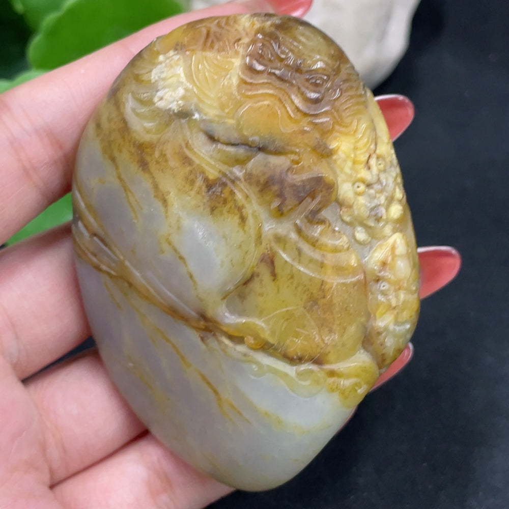Huiliu HQ Hetian Jade handheld carving of Zhong Kui, detailed jade sculpture showcasing intricate craftsmanship.