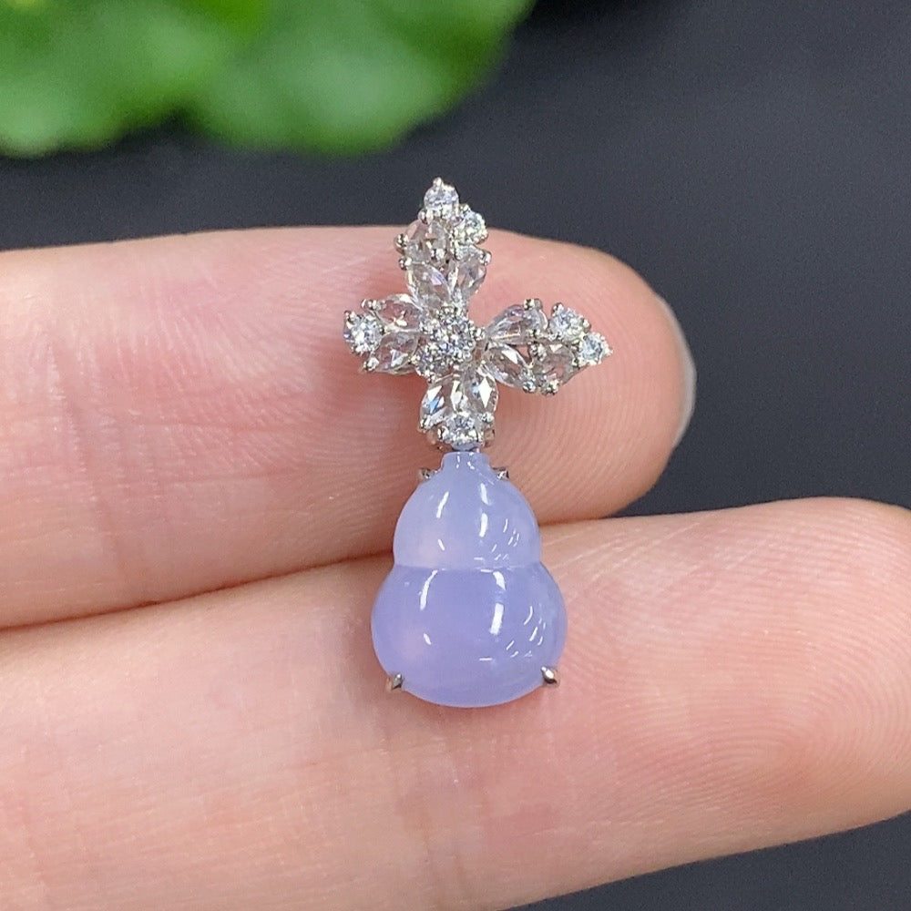 Jadeite gourd pendant with diamond accents, 18k gold inlay, from HKHQ, featuring a smooth jade surface and delicate gold details.