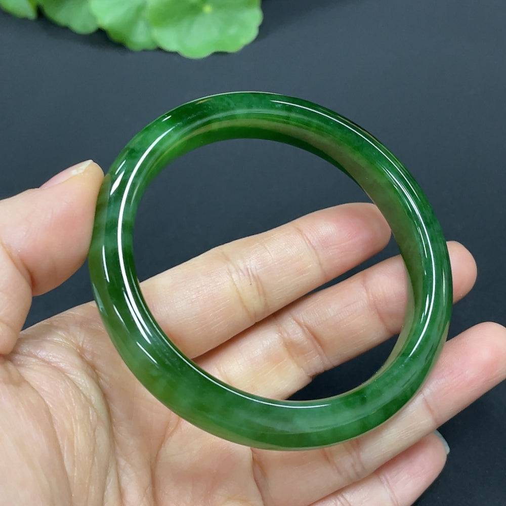 Huiliu certified Hetian jade round bracelet with smooth, polished jade beads in natural green tones.