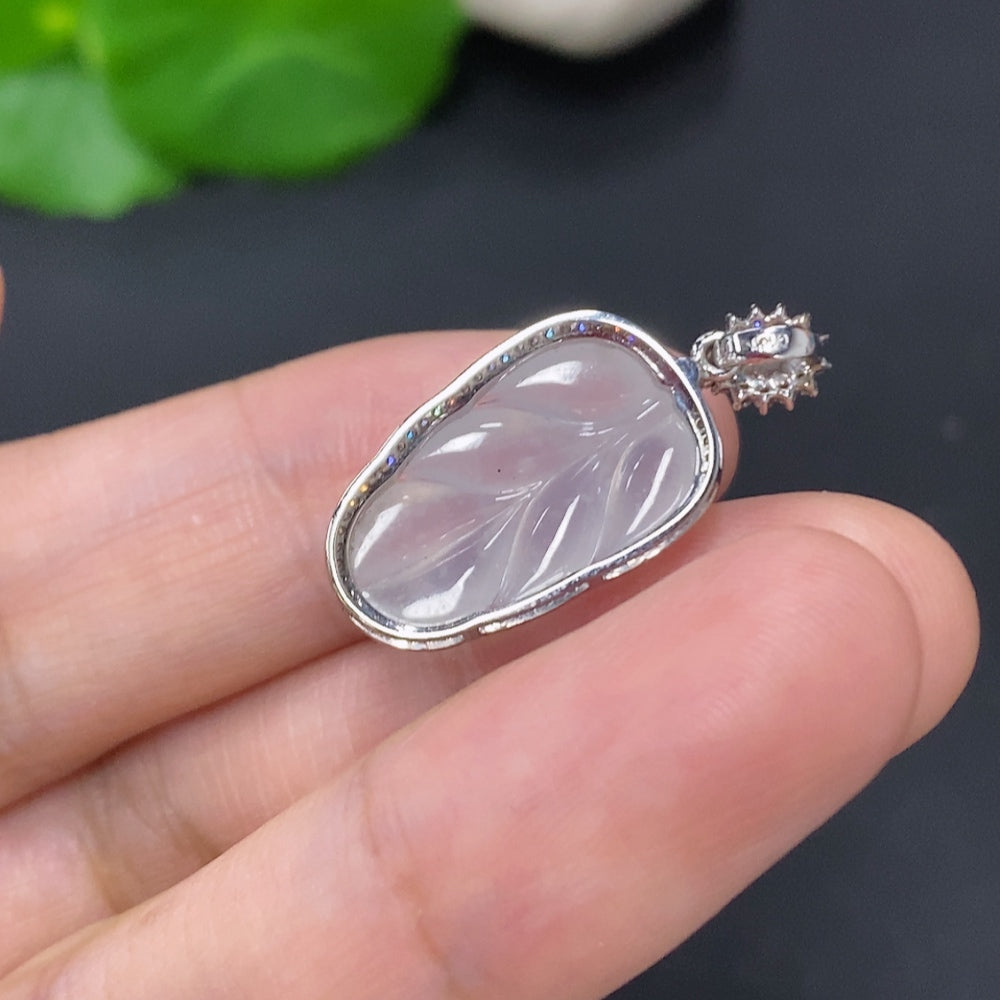 Jadeite leaf inlaid pendant with diamond accents, 18K gold, crafted by HKHQ, featuring detailed jade and gold leaf design.