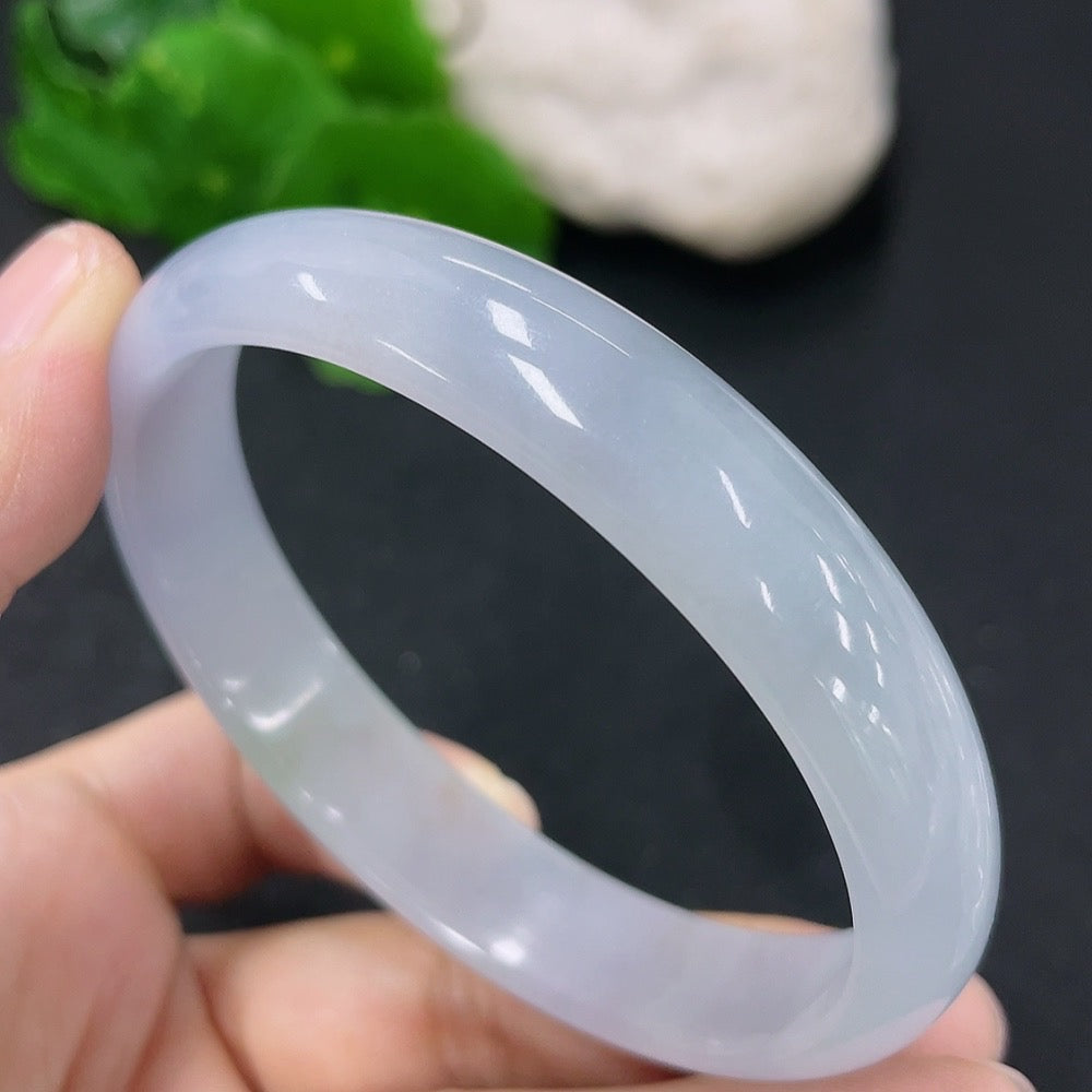 HKHQ jadeite concubine bracelet with size 57.4/48mm, weighing approximately 34.12g, featuring smooth, polished jadeite beads.