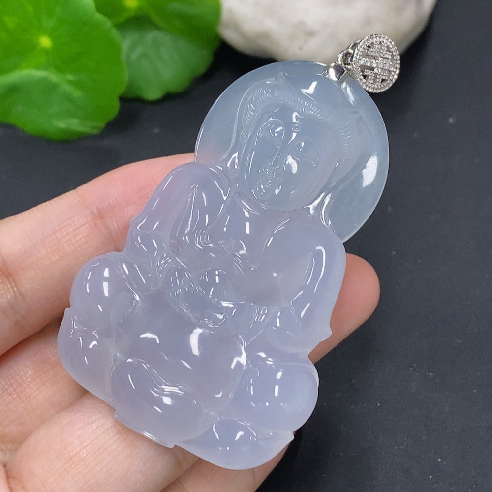 Jadeite Guanyin pendant with 18K gold clasp and diamond accents, displayed on a necklace.