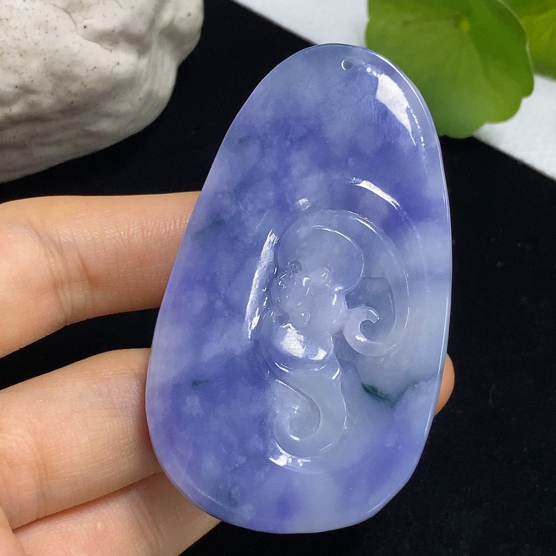 Jadeite Ruyi pendant with intricate carvings, weighing approximately 60.49g, crafted from high-quality jade by HKHQ.