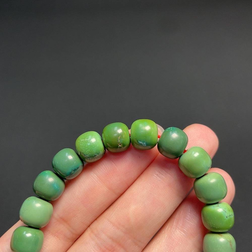 Turquoise gemstone bracelet with 8.9mm beads from HUILIU HQ, weighing approximately 25.16 grams, displayed on a neutral background.
