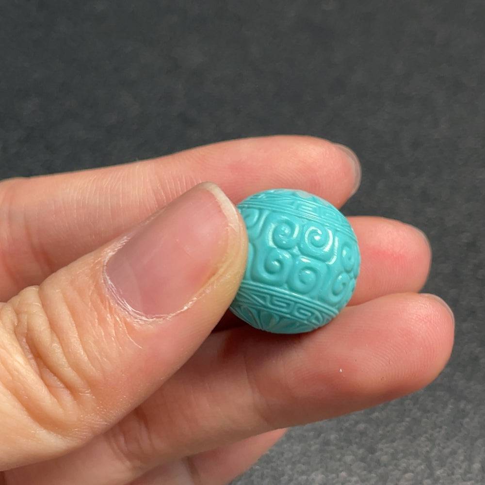Huiliu turquoise gemstone pendant, 17.7mm size, certified by HUILIU HQ, showcasing vibrant blue-green color and polished surface.