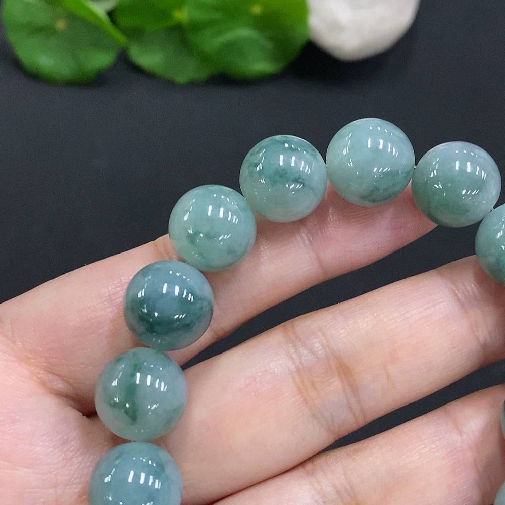 Huiliu Jadeite bead necklace with 12.4mm round beads, certified jade jewelry featuring smooth, polished green jade stones.
