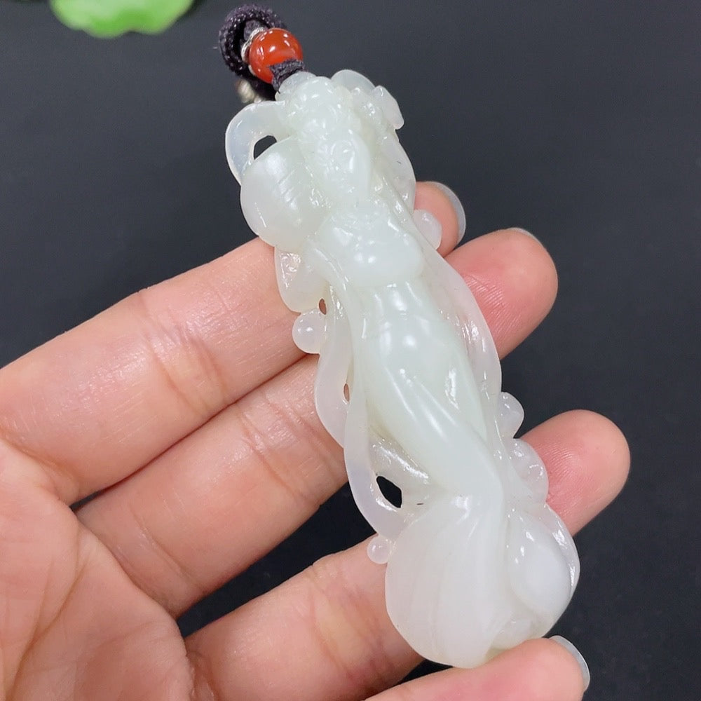 Huiliu certified Hetian jade pendant featuring a fairy design, showcasing intricate craftsmanship and smooth jade surface.