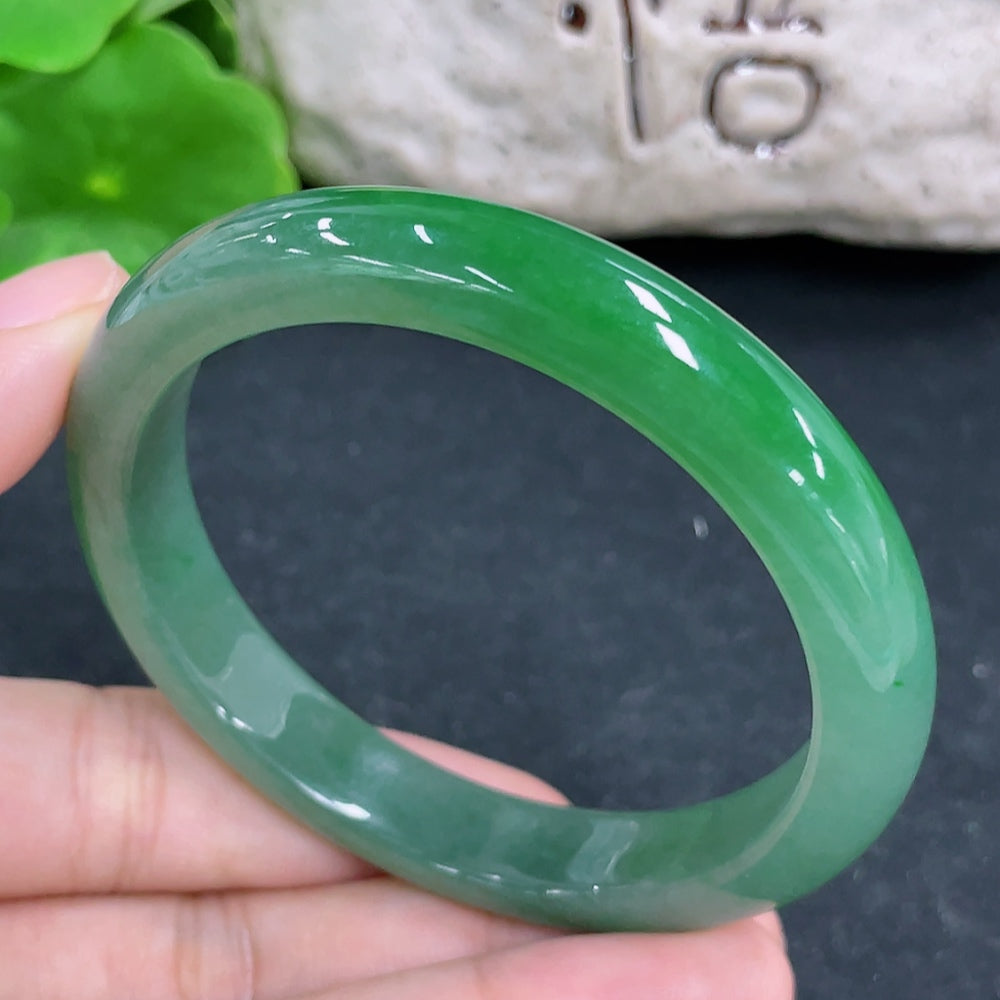 HKHQ jadeite round bangle, size 54, weighing 38.5g, featuring a smooth, polished jadeite bracelet with a rounded design.