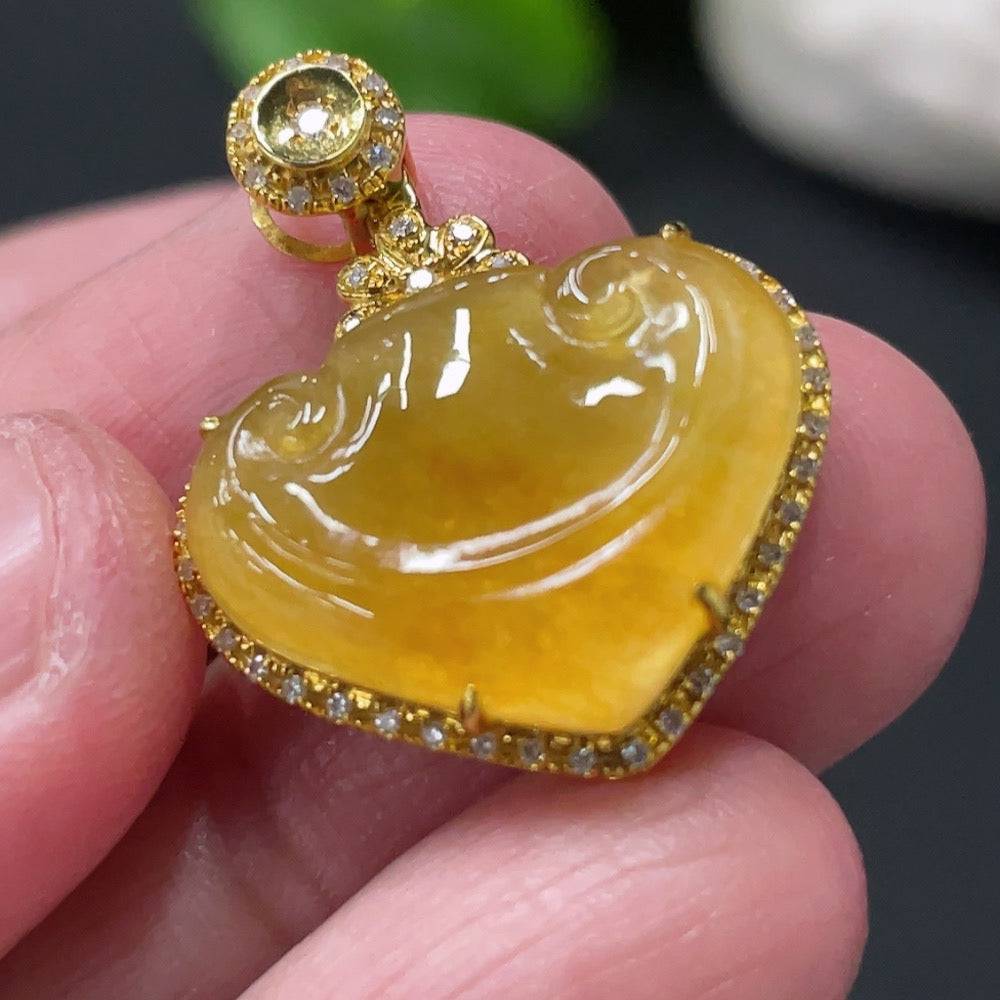 Jadeite Ruyi pendant with 18K gold and diamond accents, showcasing intricate inlay and elegant craftsmanship.