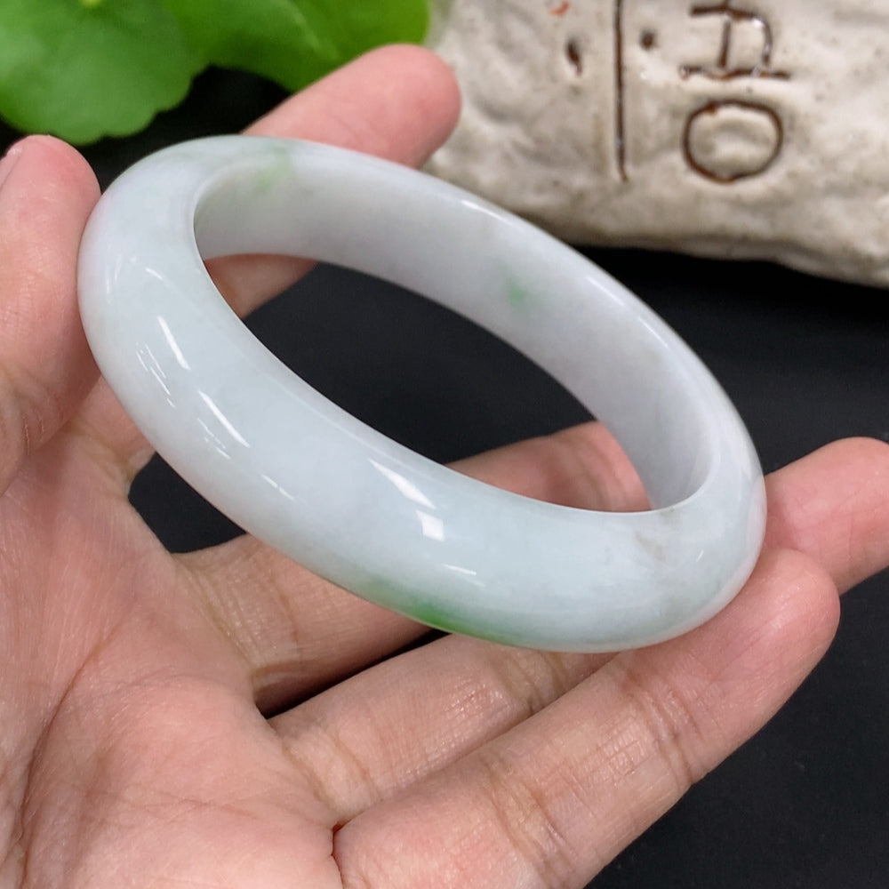 HKHQ jadeite round bangle in size 52.7 with a weight of 53.25g, showcasing smooth, polished jadeite bracelet design.