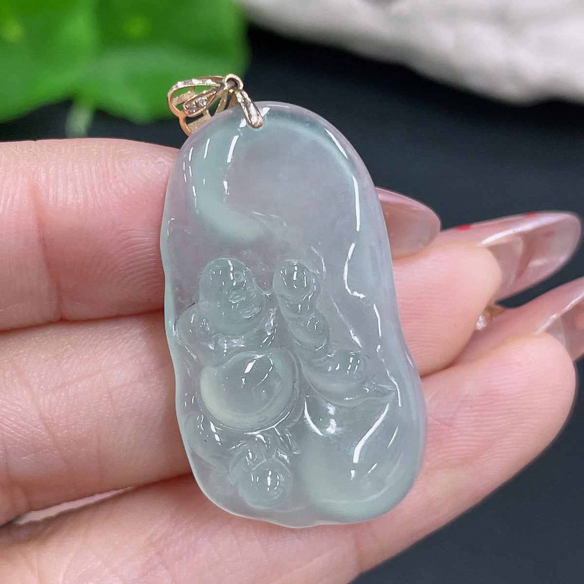 Huiliu jadeite Buddha pendant with bezel showcasing detailed carved jadeite, perfect for jewelry or spiritual wear.