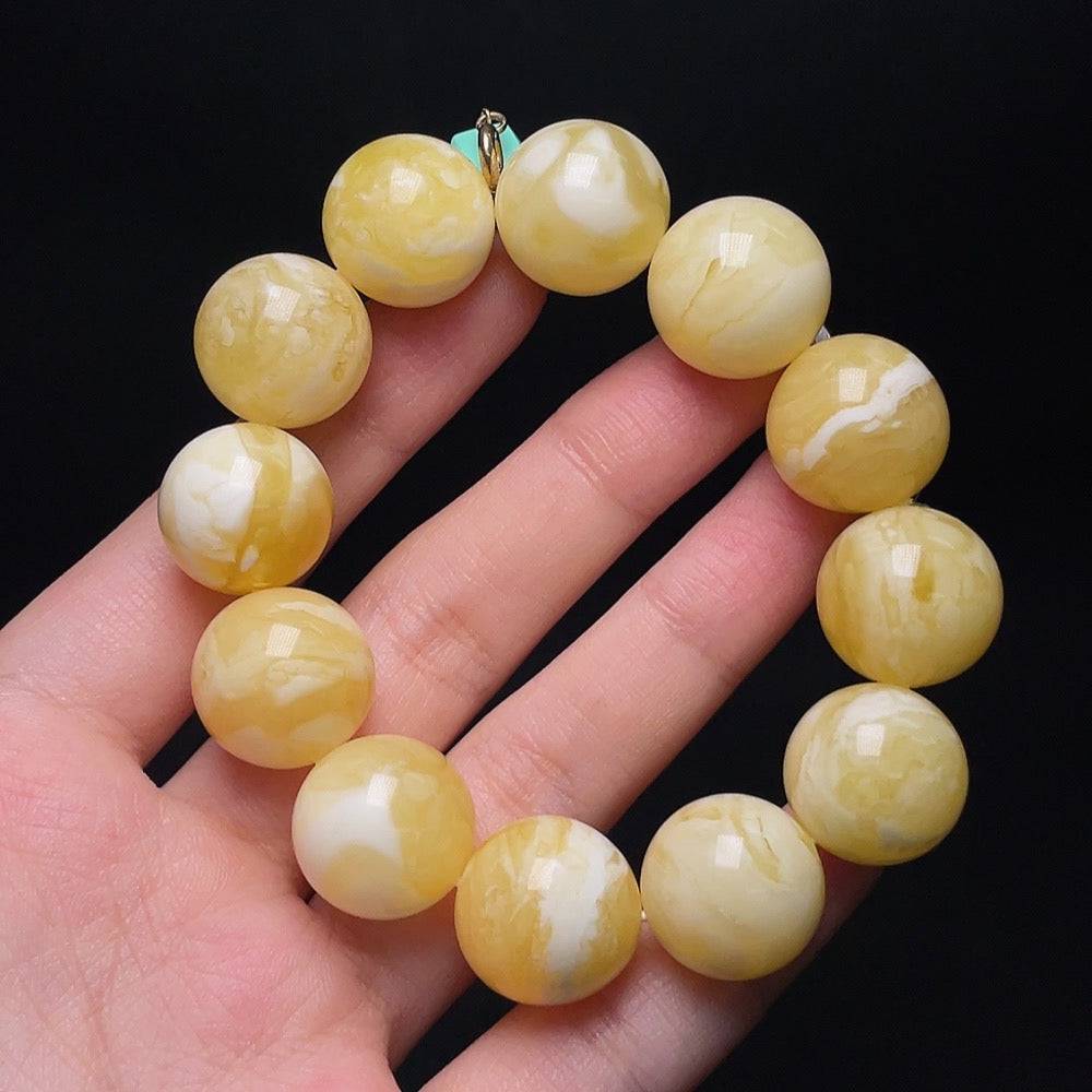 Amber bead bracelet by HUILIU HQ featuring amber beads with non-metal accents, natural and handcrafted jewelry design