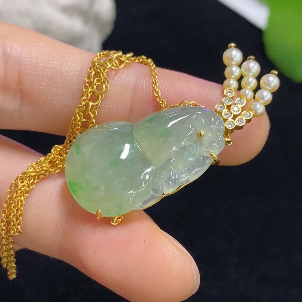 Jadeite gourd pendant set in 18k gold with diamond accents, total weight approximately 8.15g (including chain)