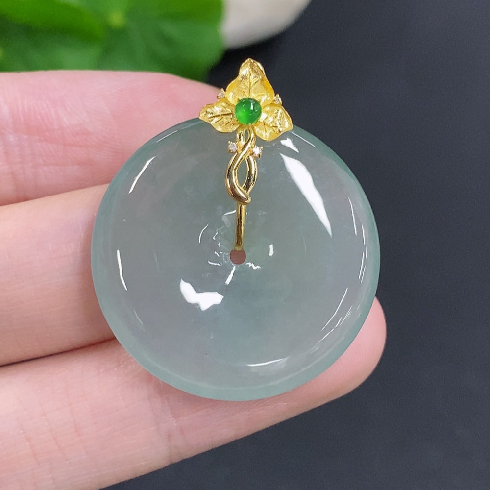 Jadeite Peace Knot pendant by HKHQ in 18K gold, weight approx. 8.8g, featuring a smooth jade pendant with intricate knot design.