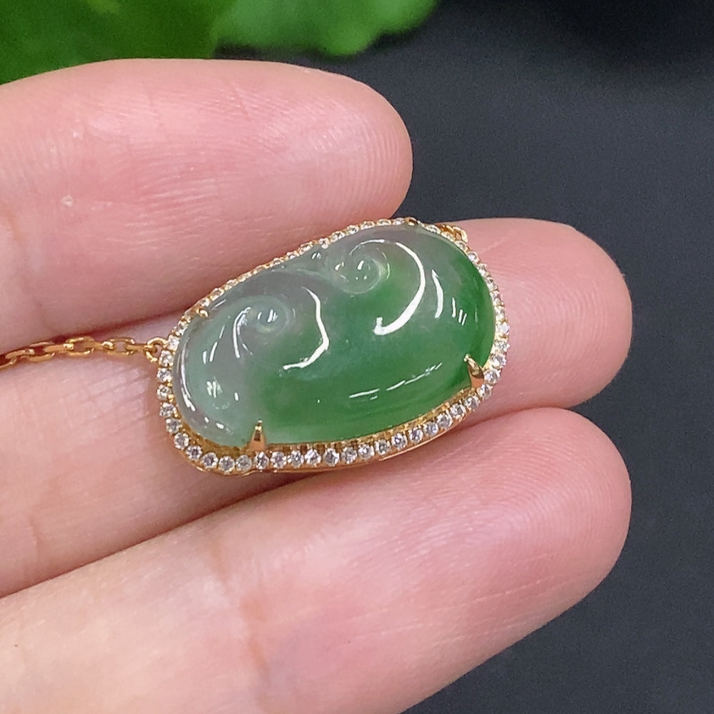 Huiliu Jadeite Ruyi pendant with diamond accents, intricately carved in jade, showcasing detailed craftsmanship and luxurious design.