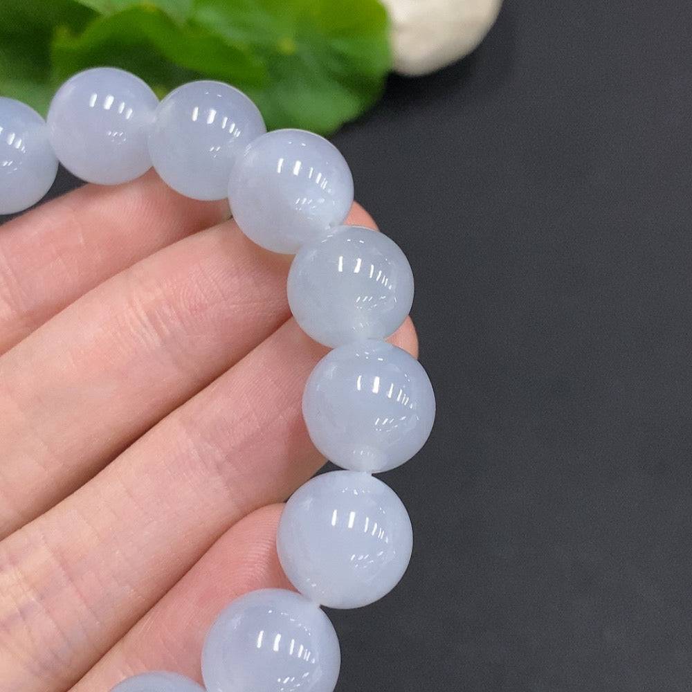 HUILIU HQ jadeite bracelet with 12mm green jade beads, weighs approx. 50.3g, showcasing smooth polished stones.
