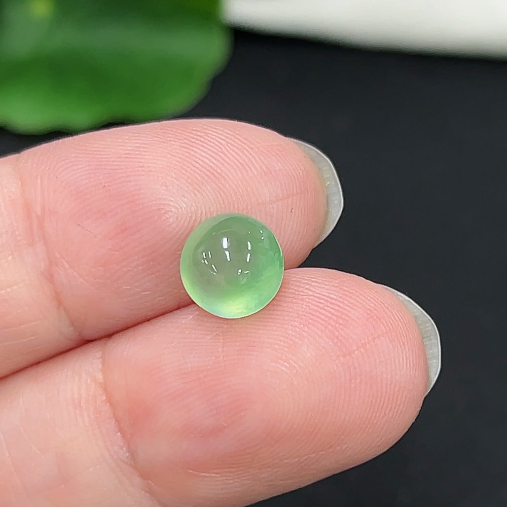 Jadeite cabochon jewelry piece with a total weight of 0.3g, showcasing smooth green gemstone from HKHQ.