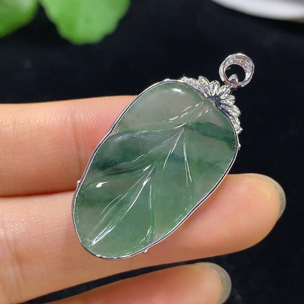 Jadeite leaf inlaid pendant with 18k gold and diamond accents, crafted by HUILIU HQ, weighing approximately 4.65 grams.