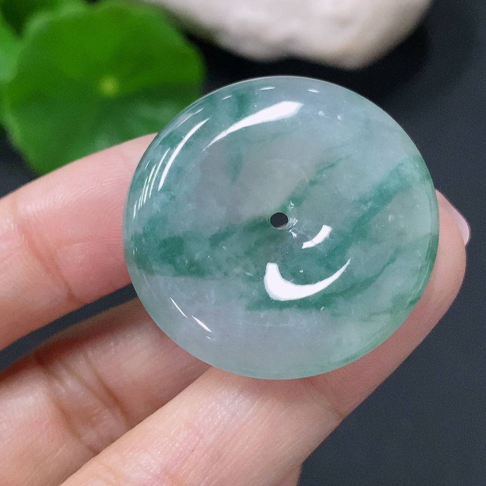 HUILIU HQ Jadeite pendant with peace knot design, weighing approximately 9.58g, featuring smooth green jade stone.