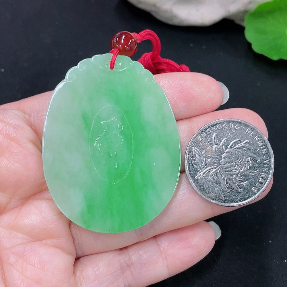 Jadeite tiger on mountain pendant by HUILIU HQ, featuring detailed green jade carving of a tiger and mountain scene.