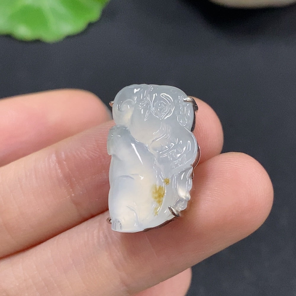 Jadeite elephant pendant by HKHQ with intricate inlaid design, weighing approximately 3.28 grams, showcasing detailed craftsmanship.