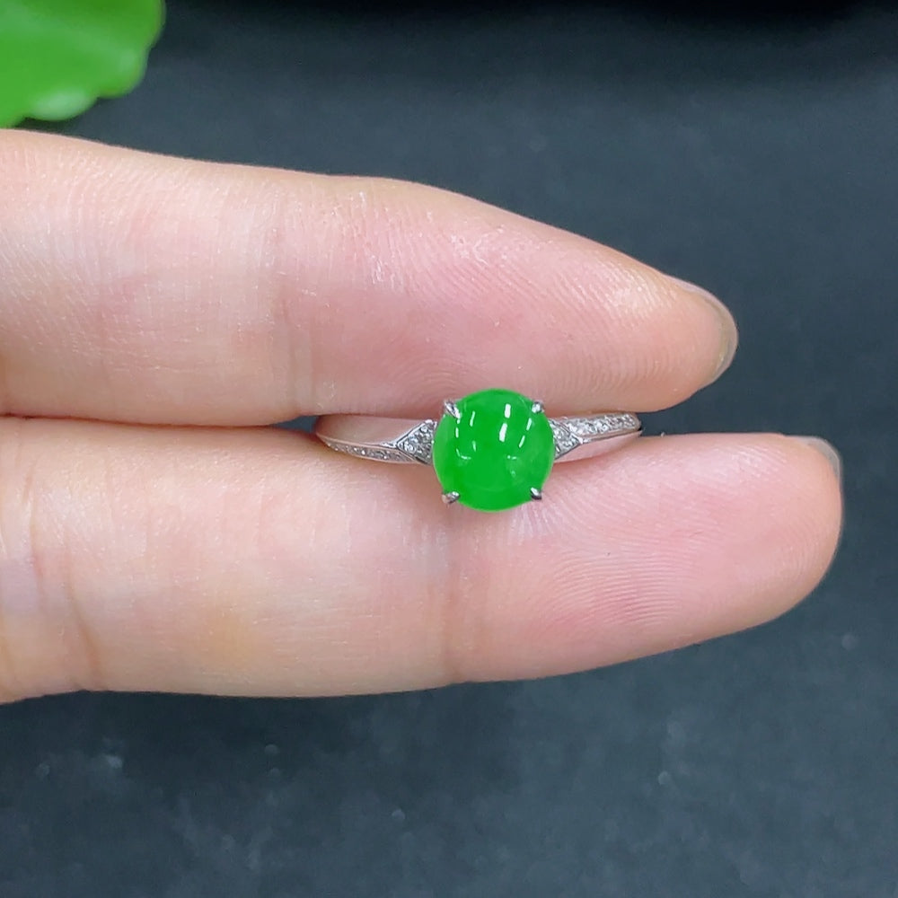 Close-up of HKHQ jadeite ring with diamond accents, size 13, showing the shank and natural origin details underneath the jadeite.
