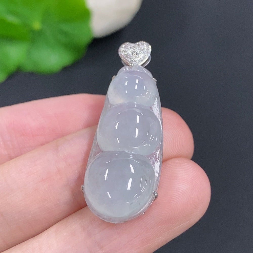 Jadeite lucky bean pendant with 18k gold and diamond accents, weighing approximately 4 grams, from HKHQ.