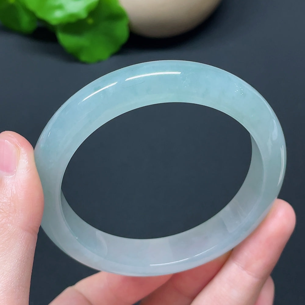 HKHQ jadeite round bangle in size 57.2 with a weight of 56.76g, showcasing smooth, polished jadeite craftsmanship.