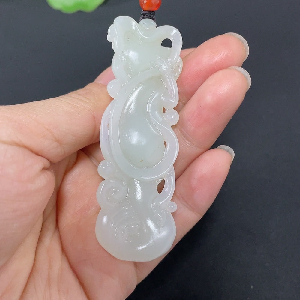 Huiliu certified Hetian jade fairy pendant featuring intricate craftsmanship and smooth green jade surface.