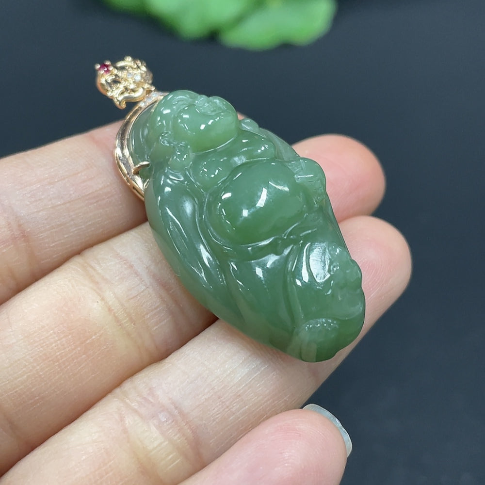 Hetian jade Buddha pendant with 18K gold inlay, accented with diamonds, weighing approximately 13.7g, from HKHQ.