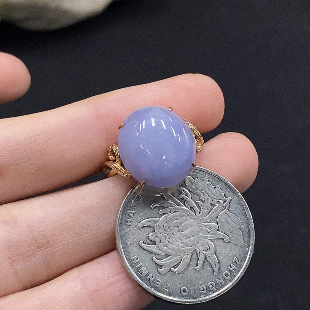 Huiliu jadeite cabochon ring with diamond accents, featuring a polished jade gemstone and elegant silver band.