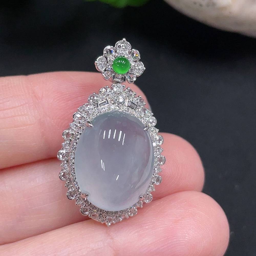 Jadeite pendant with 18K gold mount accented with diamonds, crafted by HUILIU HQ, features a polished green jade stone.