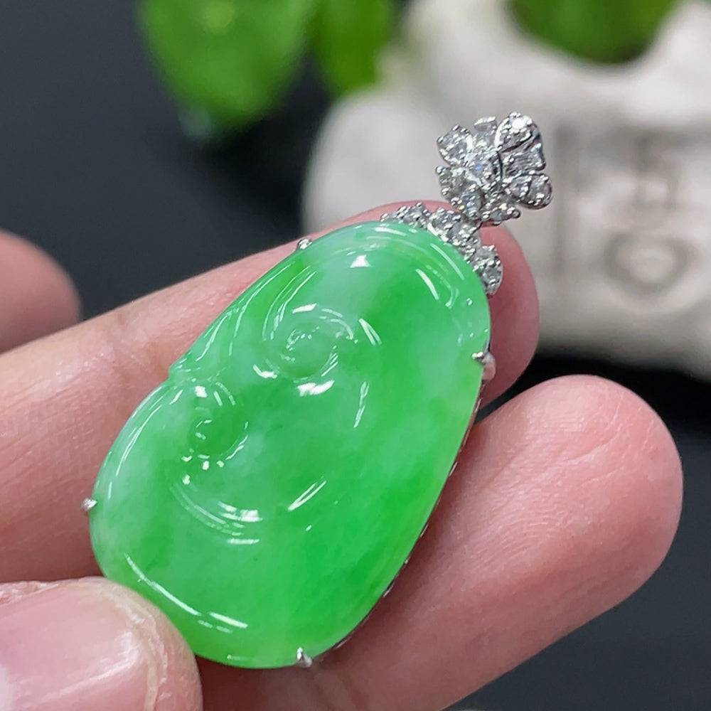 Jadeite Ruyi pendant with 18K gold and diamond accents, featuring intricate inlay work and a smooth jade surface.